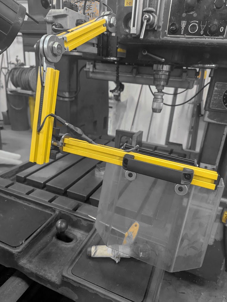Articulated drill-press chip shield